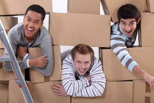 Boxes and furniture arranged to illustrate cubic-yard self storage pricing