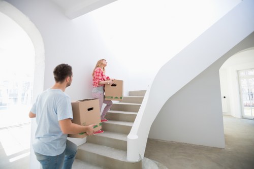 Man and van moving furniture in a Wimbledon residential street