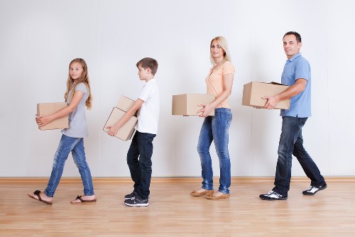 Packed boxes and furniture being loaded for removals in Wimbledon